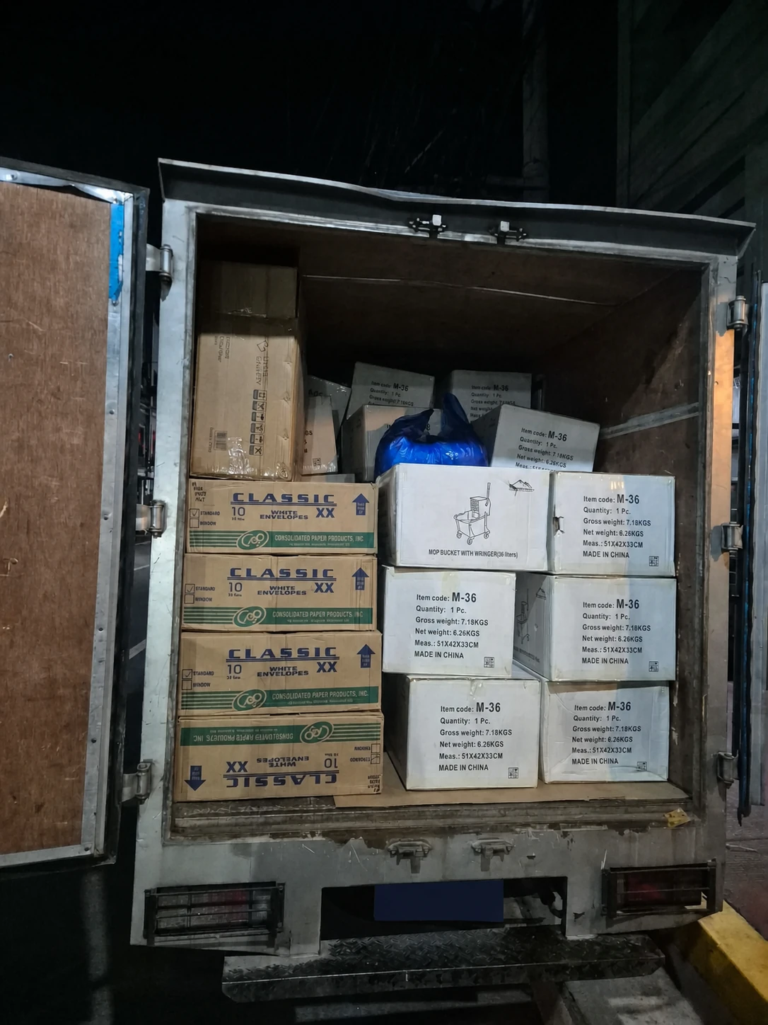 An MR14 delivery vehicle loaded with boxed customer requirements